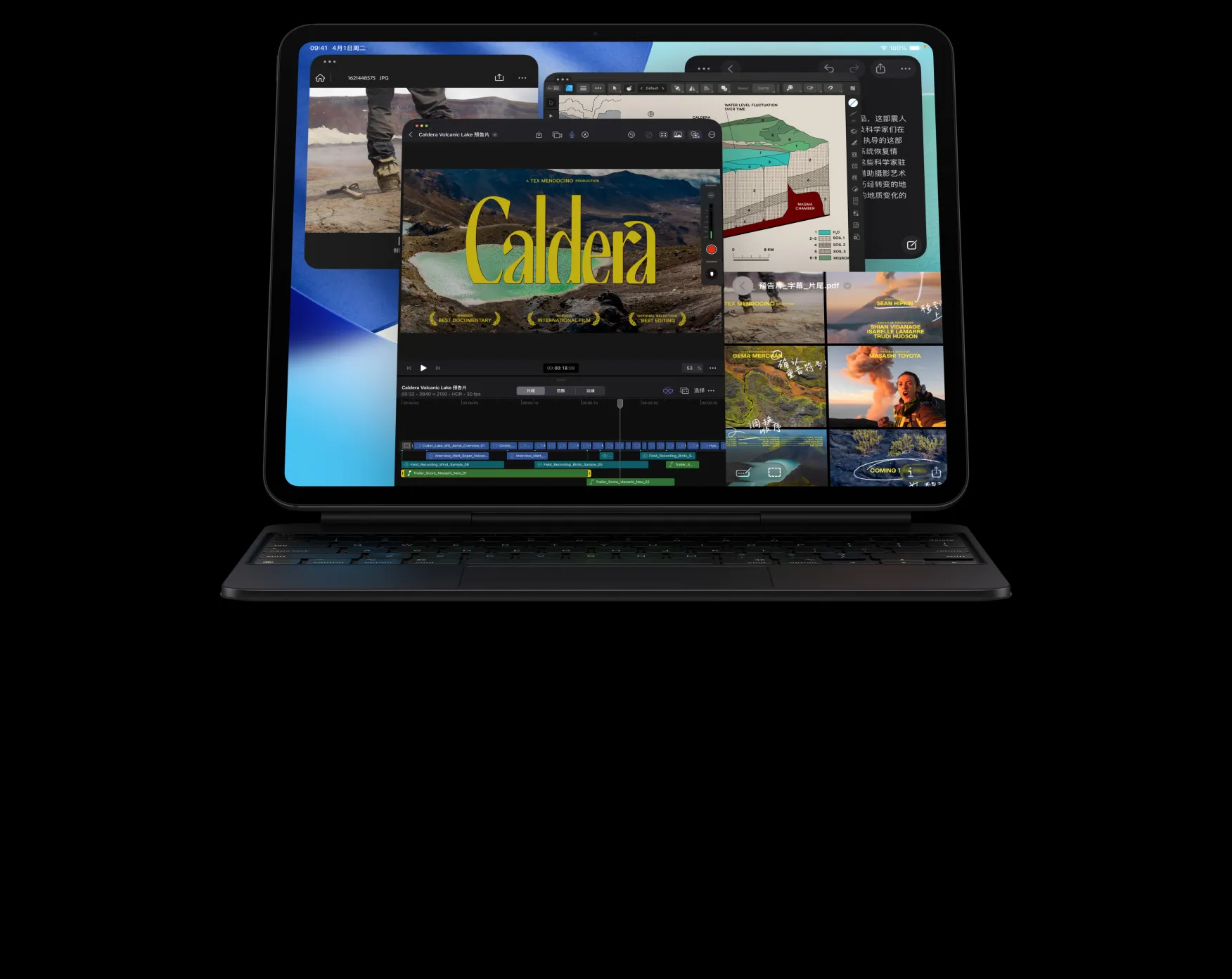 深空黑色 iPad Pro 横屏放置并与深空黑色妙控键盘相连，正面外观展示屏幕上的多个 app 窗口，包括支持多种视频剪辑功能和时间线的 Final Cut Pro 展示、地图 app、备忘录 app 和媒体片段。